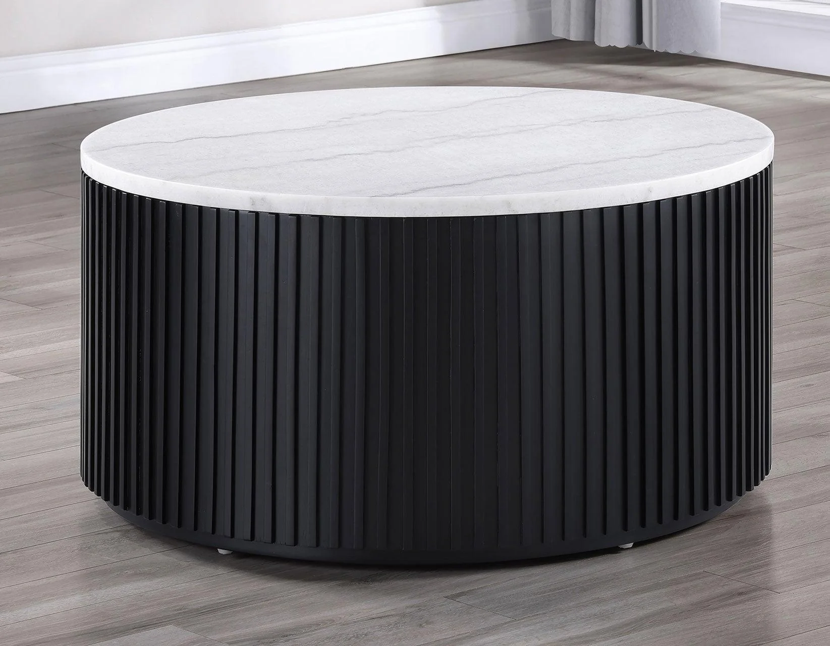 Colvin Black Finish 36″ Round Castered White Marble Top Coffee Table
