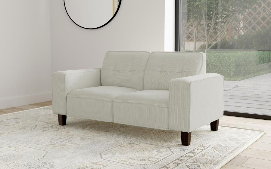 Deerhurst Beige Upholstered Tufted Track Arm Loveseat