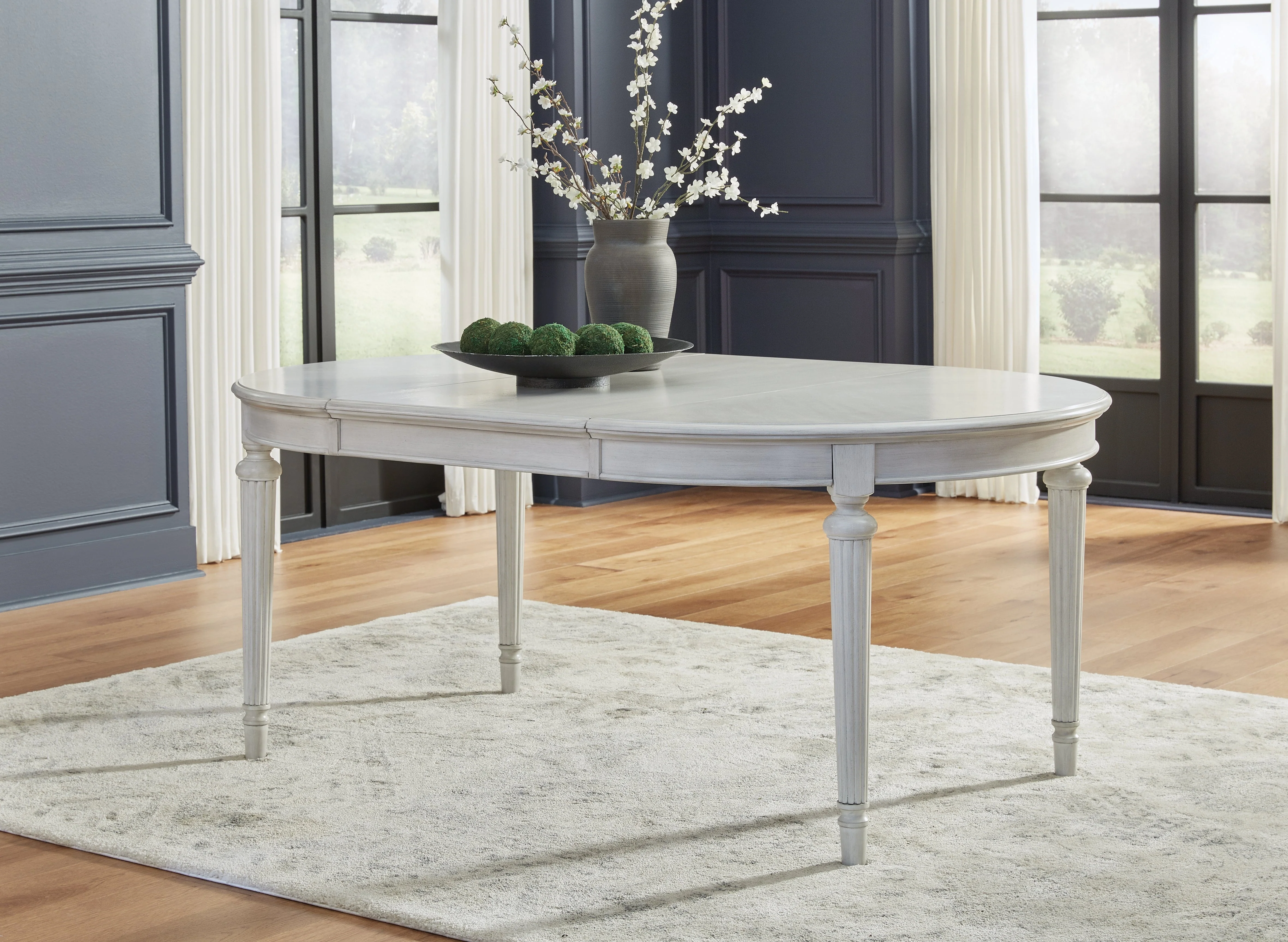 Montelaine Antiqued White Extendable Dining Room Set - Image 17