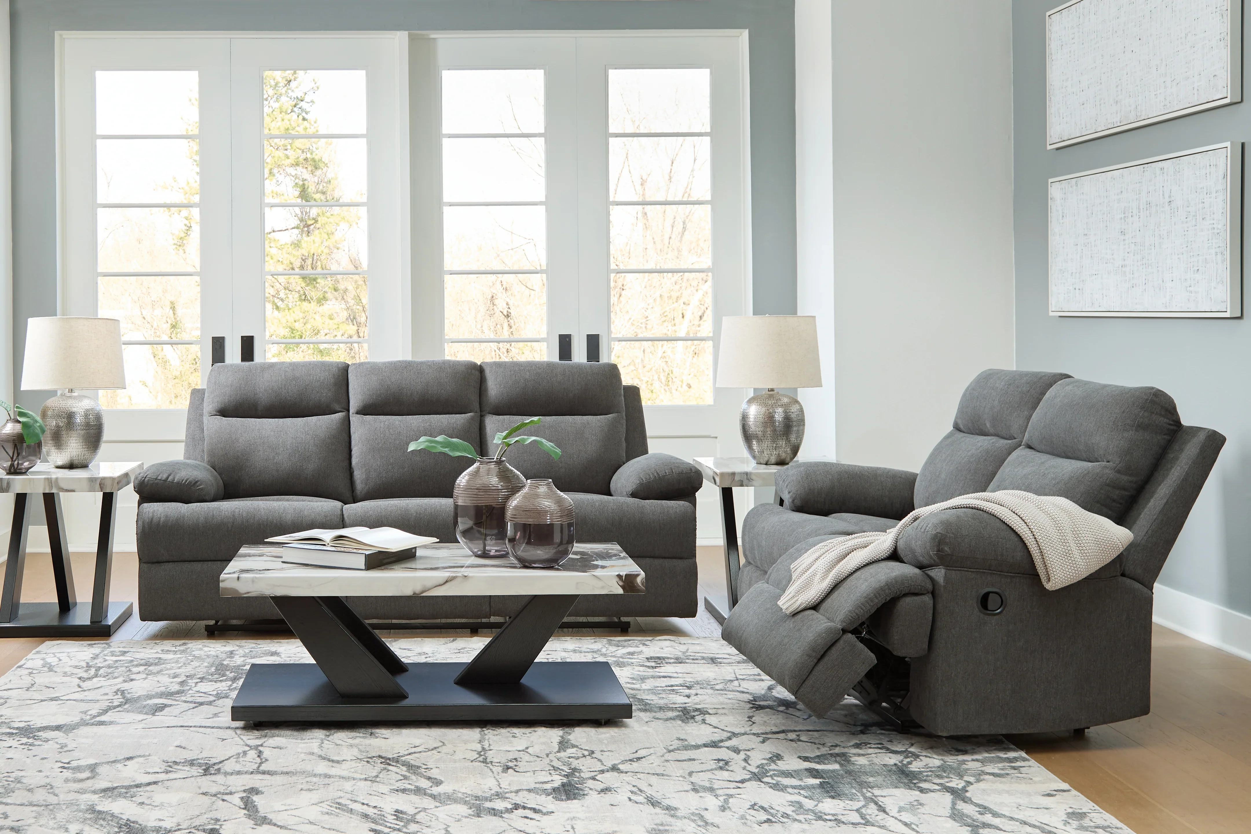 Side-Swipe Charcoal Manual Reclining Sofa & Loveseat